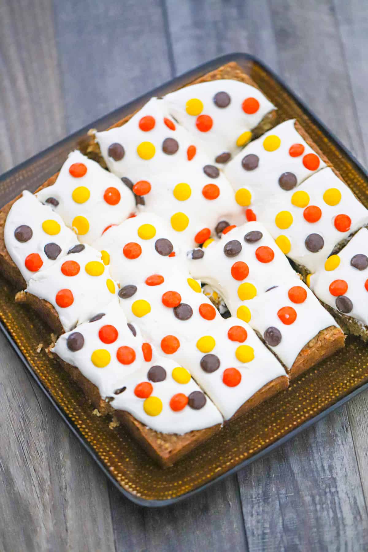 fall baking or halloween Reese's Pieces Oatmeal Cream Pie Bars recipe for party fun!