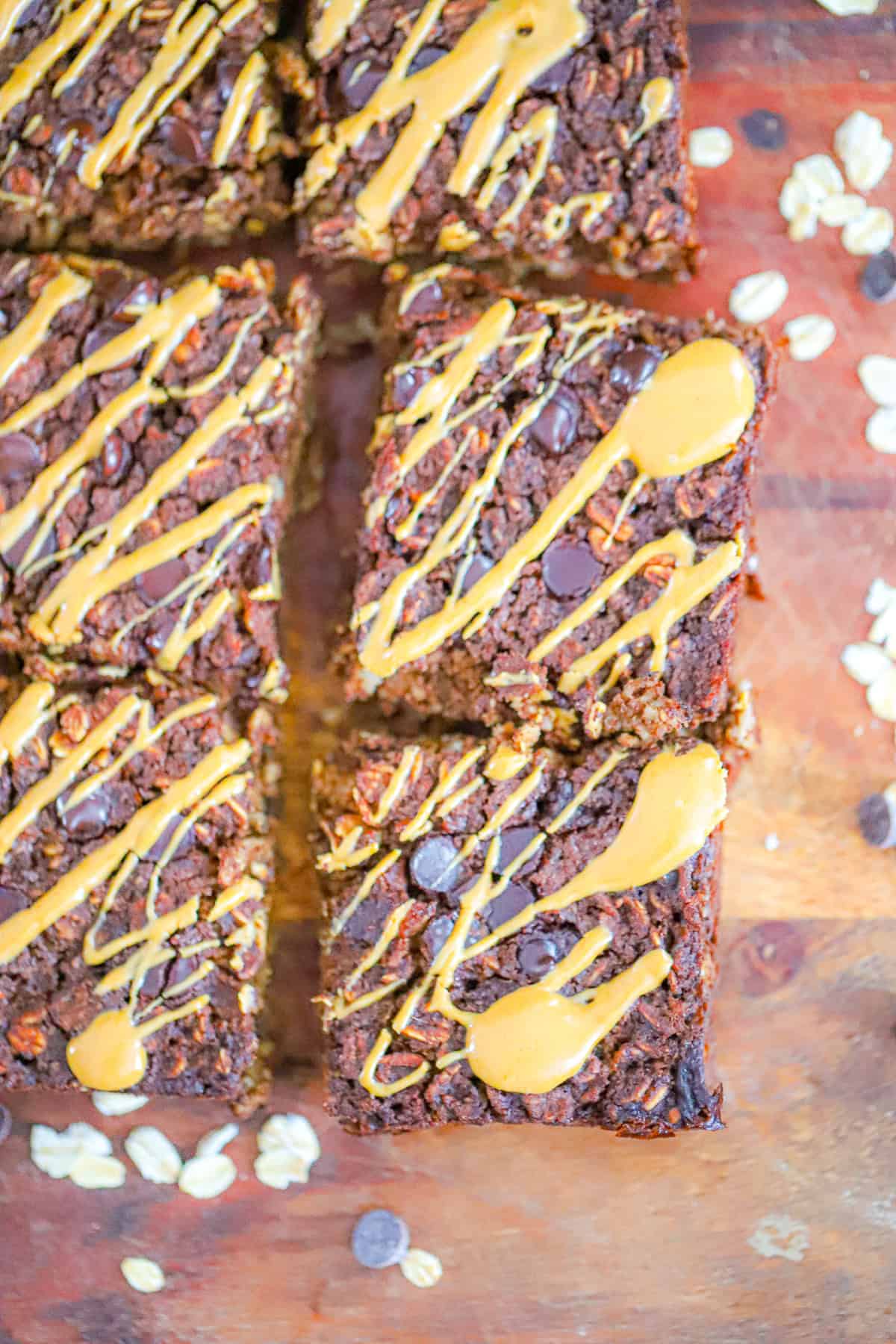 Mixing bowl with baked brownie oatmeal batter ready to bake
