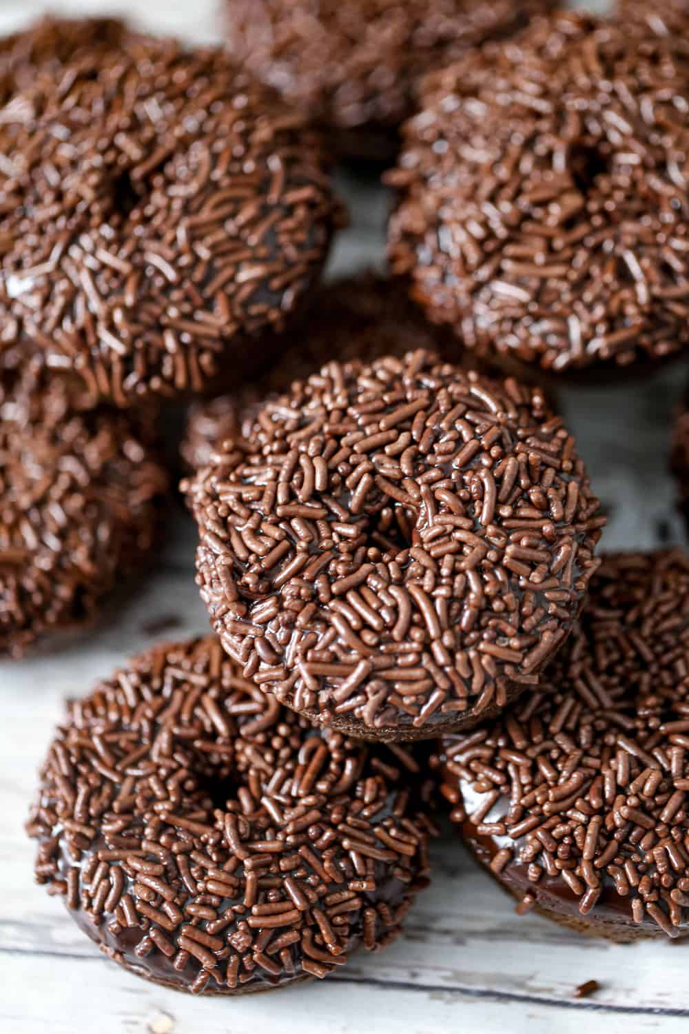 These Fun Chocolate Sprinkle Donuts make the most fun breakfast or party goodies and they&rsquo;re easy to mix up since they&rsquo;re baked instead of fried!&nbsp; These mini chocolate donuts are perfect for Halloween and when chocolate treats are on the radar!