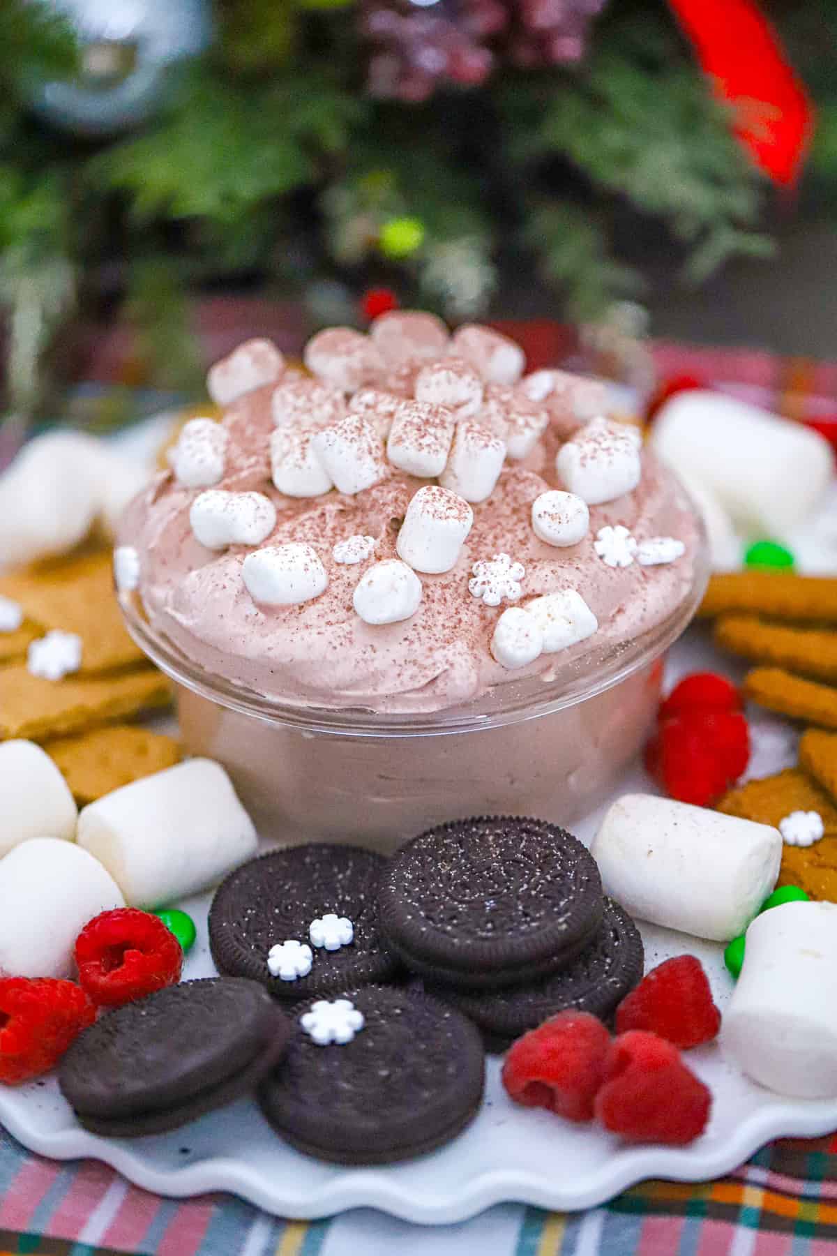 fluffy hot cocoa dip in a bowl with mini marshmallows