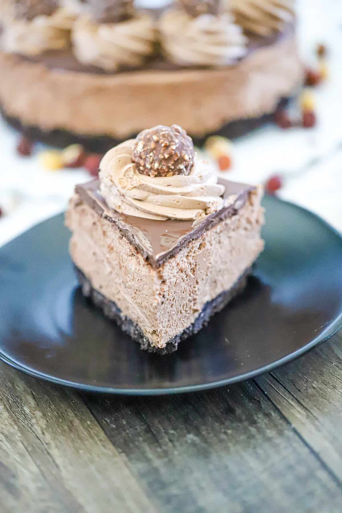 slice of Best Ever No Bake Nutella Cheesecake recipe chocolate hazelnut