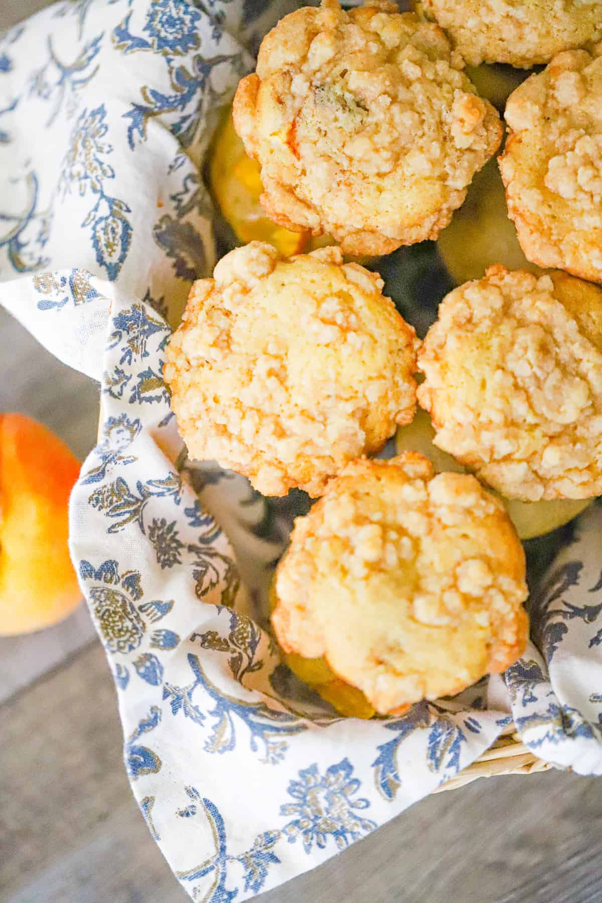 ingredients laid out for bakery style vanilla peach muffins recipe