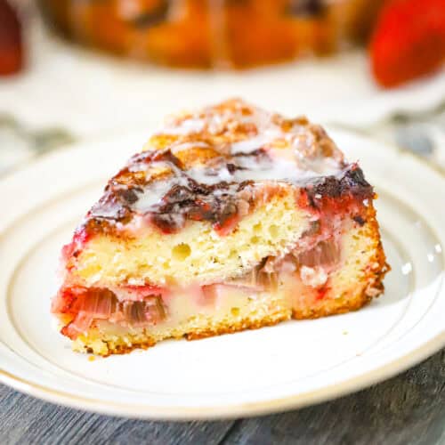A slice of strawberry cake on a plate