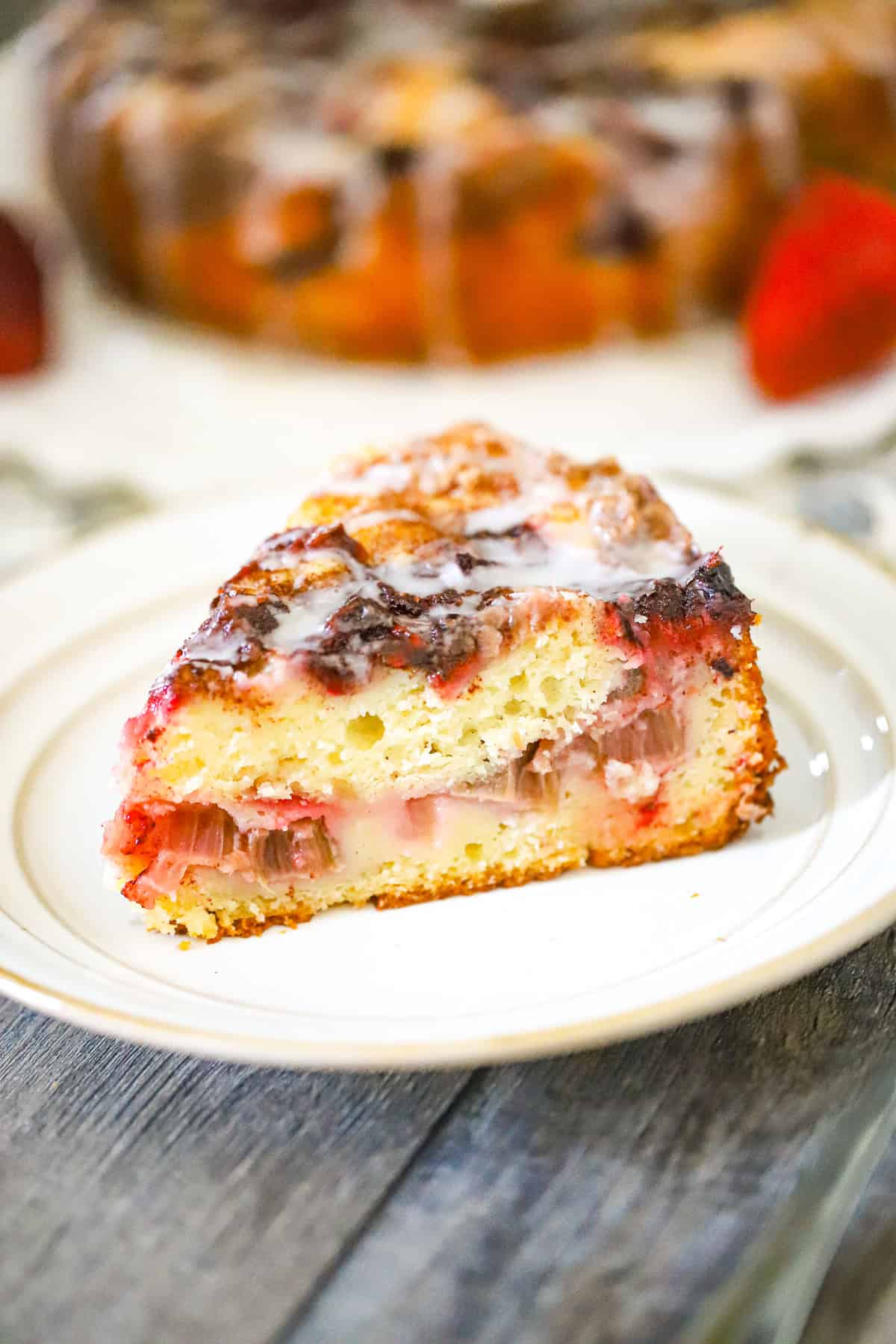 A slice of strawberry cake on a plate
